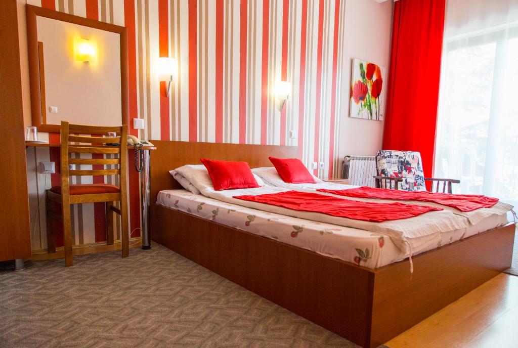 Postel nebo postele na pokoji v ubytování Hotel Pine