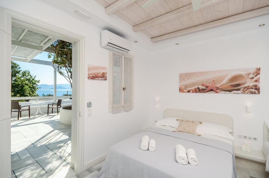 Posteľ alebo postele v izbe v ubytovaní Ostria Hotel