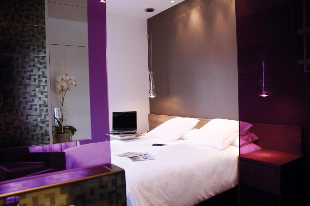 Postel nebo postele na pokoji v ubytování Citiz Hotel