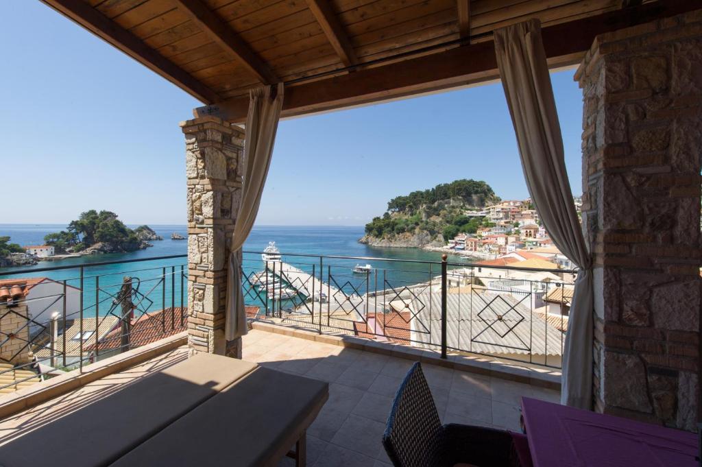 a view of the ocean from a balcony at Petros Penthouse in Parga