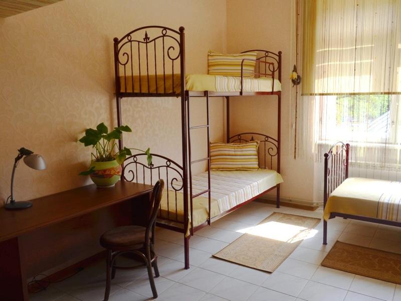 Postel nebo postele na pokoji v ubytování Centre Hostel