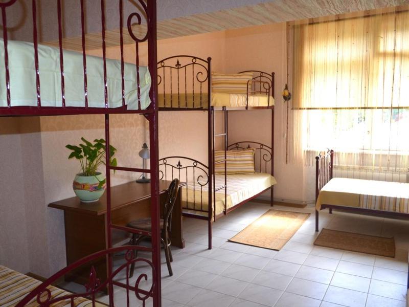 Postel nebo postele na pokoji v ubytování Centre Hostel
