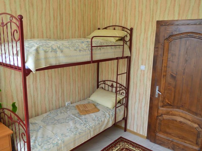 Postel nebo postele na pokoji v ubytování Centre Hostel