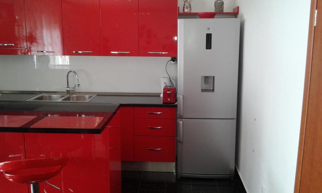Kuchyň nebo kuchyňský kout v ubytování Apartmani Jukic