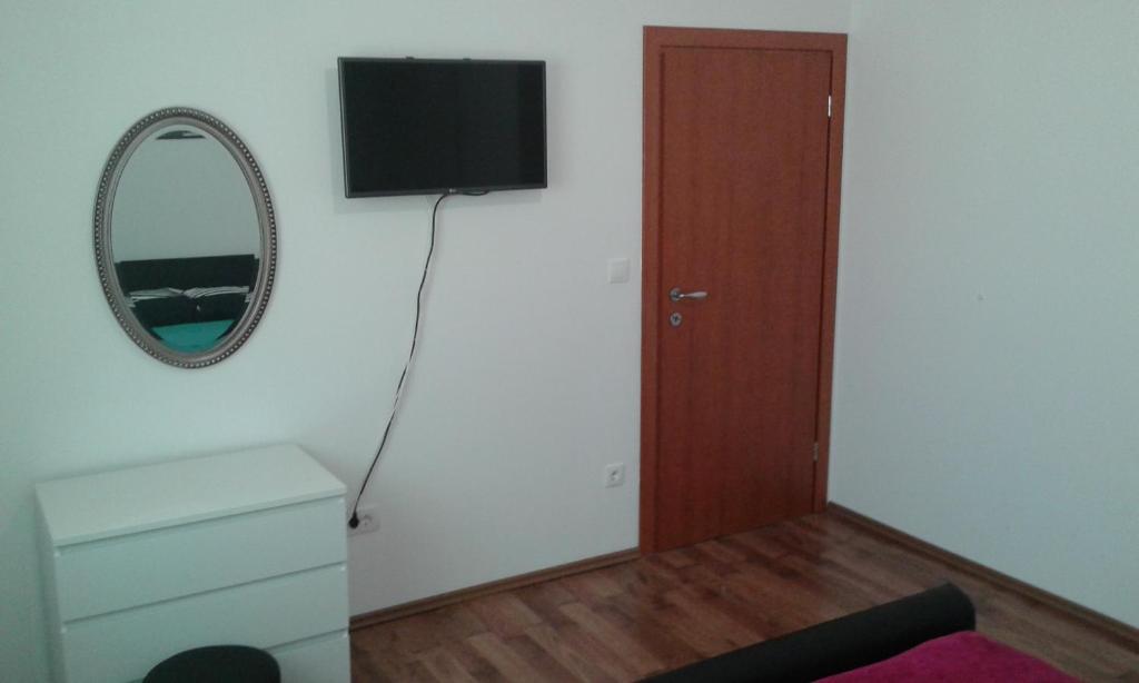 TV a/nebo společenská místnost v ubytování Apartmani Jukic