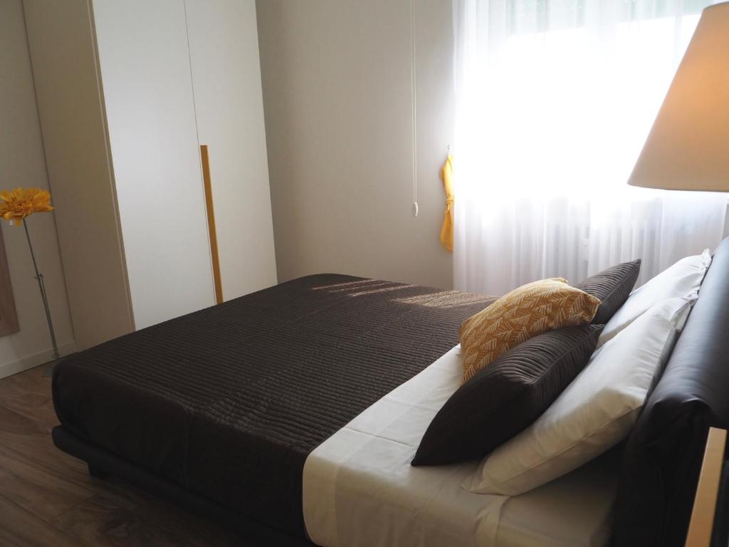 Postel nebo postele na pokoji v ubytování Suite Home Sophie