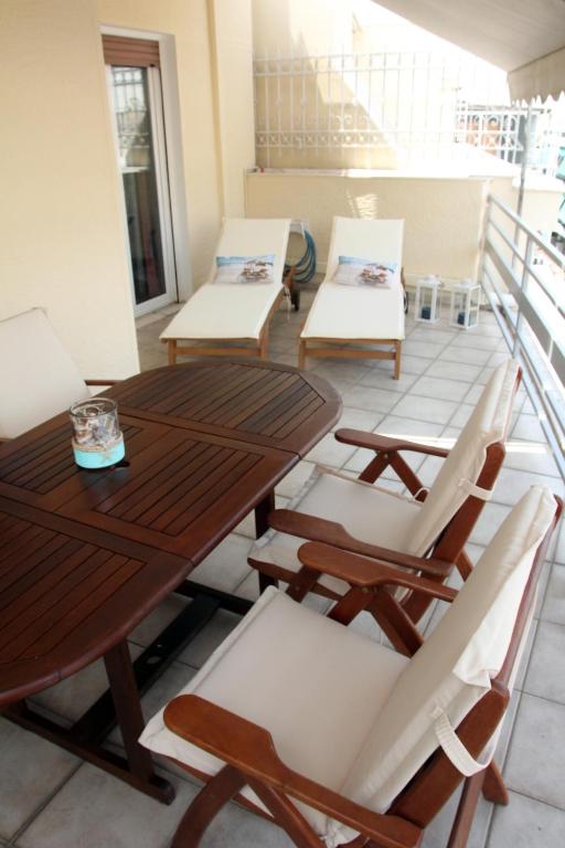 Posedenie v ubytovaní Acropolis View Luxury Suite