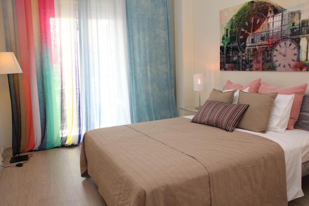 Posteľ alebo postele v izbe v ubytovaní Acropolis View Luxury Suite
