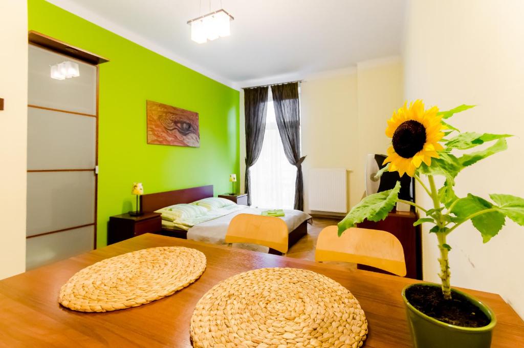 Postel nebo postele na pokoji v ubytování Fantasia Apartments