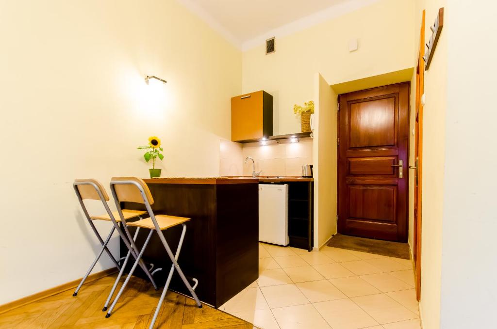 Kuchyň nebo kuchyňský kout v ubytování Fantasia Apartments