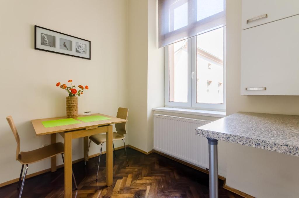 Kuchyň nebo kuchyňský kout v ubytování Fantasia Apartments