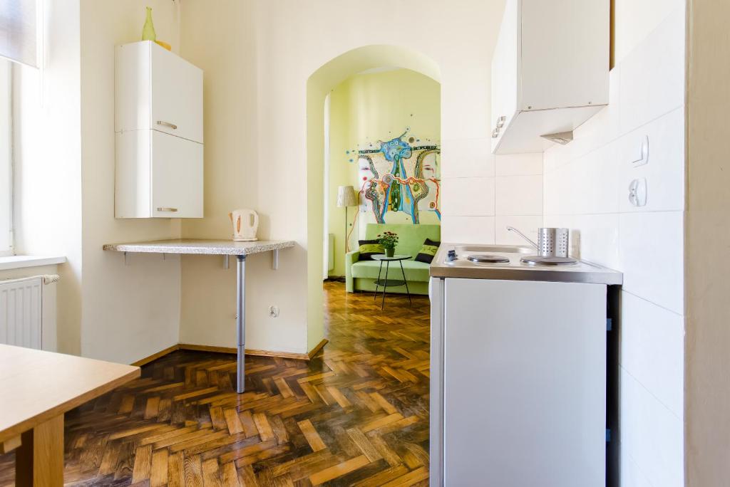 Kuchyň nebo kuchyňský kout v ubytování Fantasia Apartments