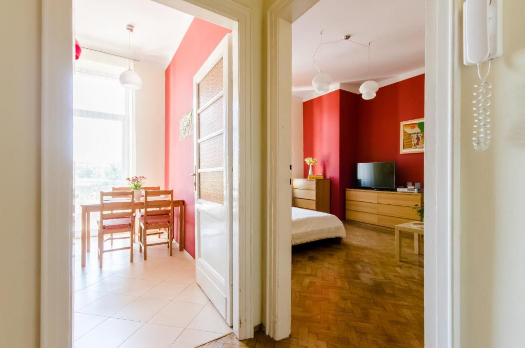 Postel nebo postele na pokoji v ubytování Fantasia Apartments