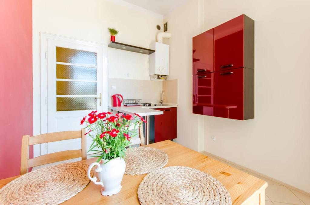 Kuchyň nebo kuchyňský kout v ubytování Fantasia Apartments
