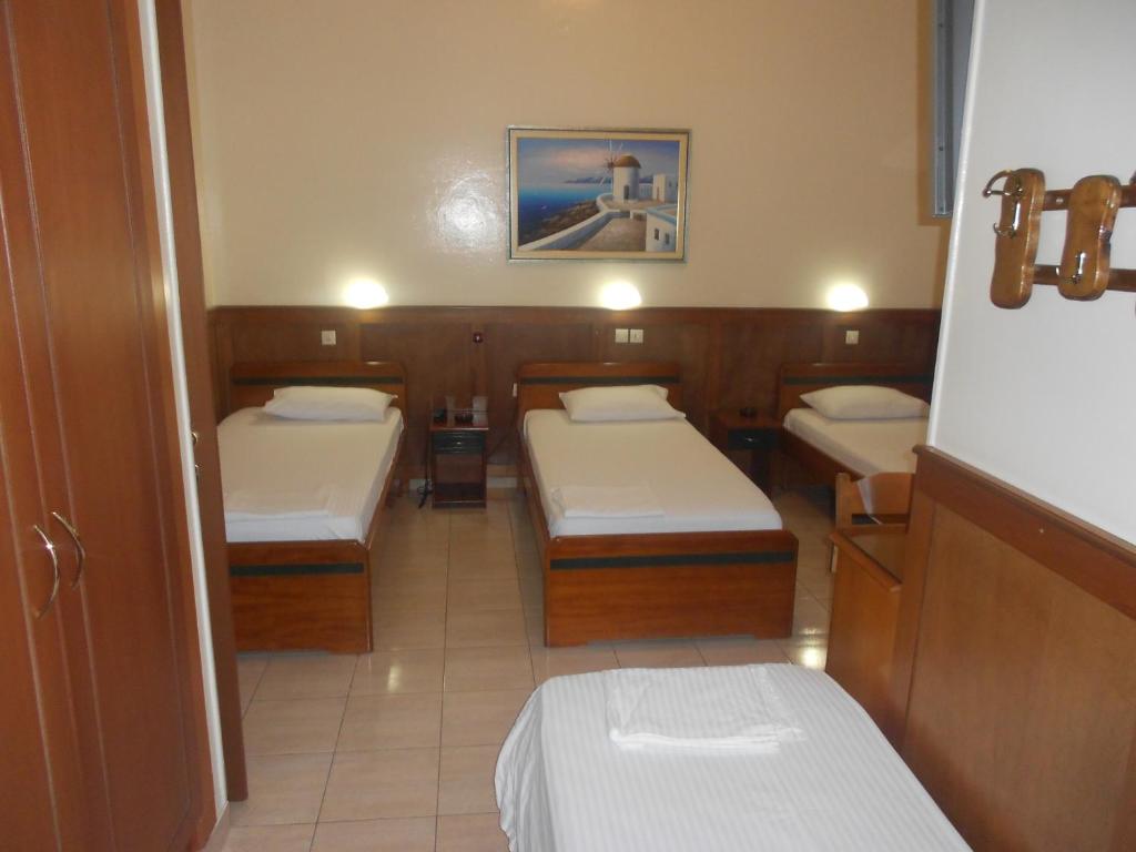 Voodi või voodid majutusasutuse Hotel Admitos toas