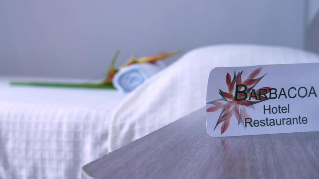 Postel nebo postele na pokoji v ubytování Hotel Barbacoa Uraba