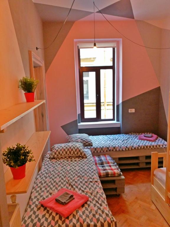 Postel nebo postele na pokoji v ubytování Cloud 9 Living