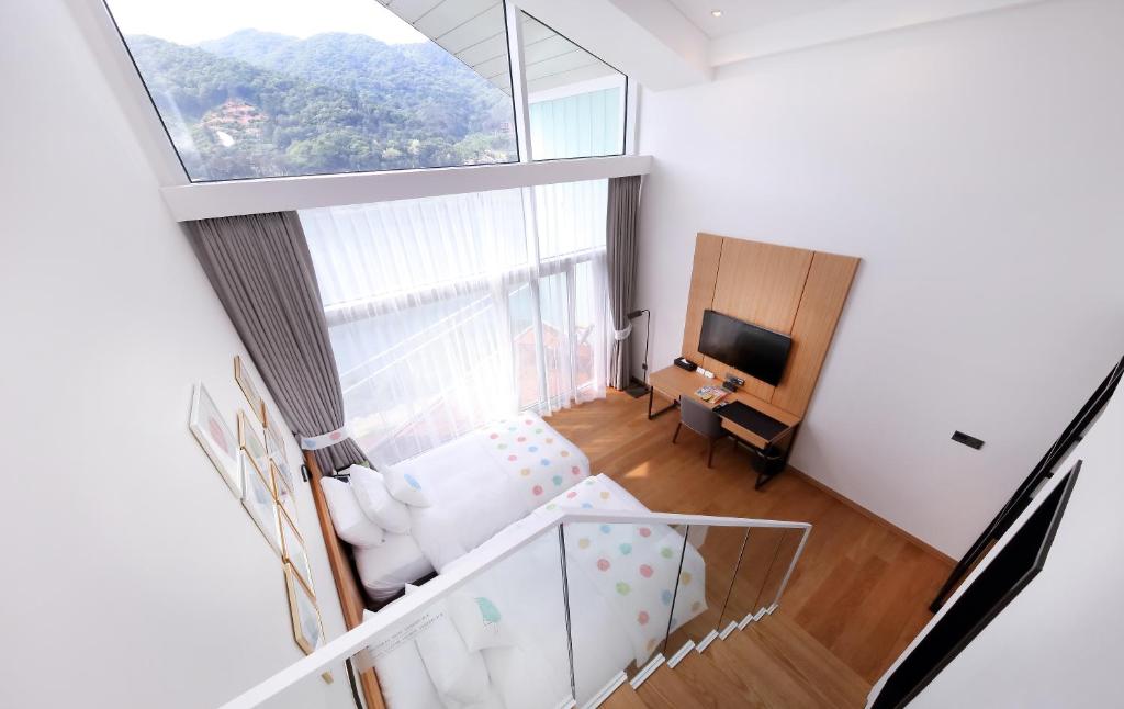 TV a/nebo společenská místnost v ubytování Midas Hotel & Resort