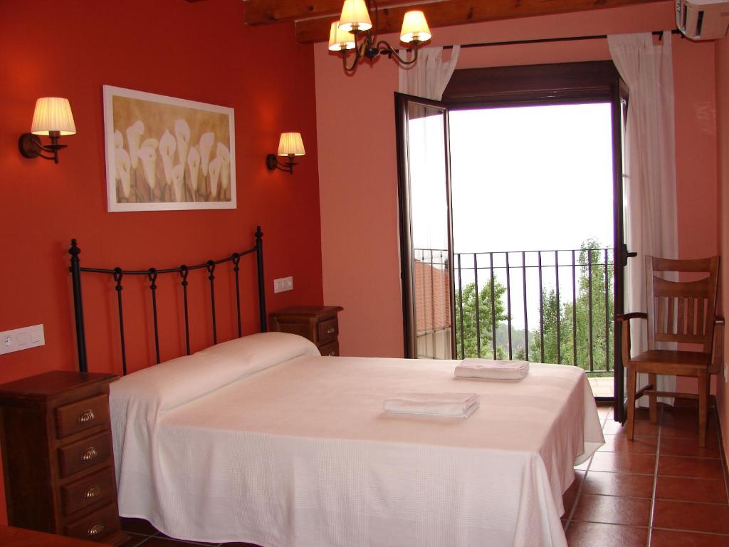 Cama o camas de una habitación en Apartamentos Sierra de Segura