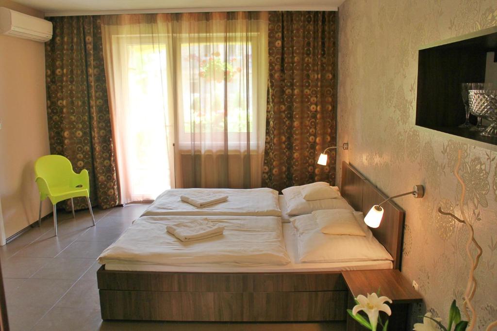 Postel nebo postele na pokoji v ubytování Toskána