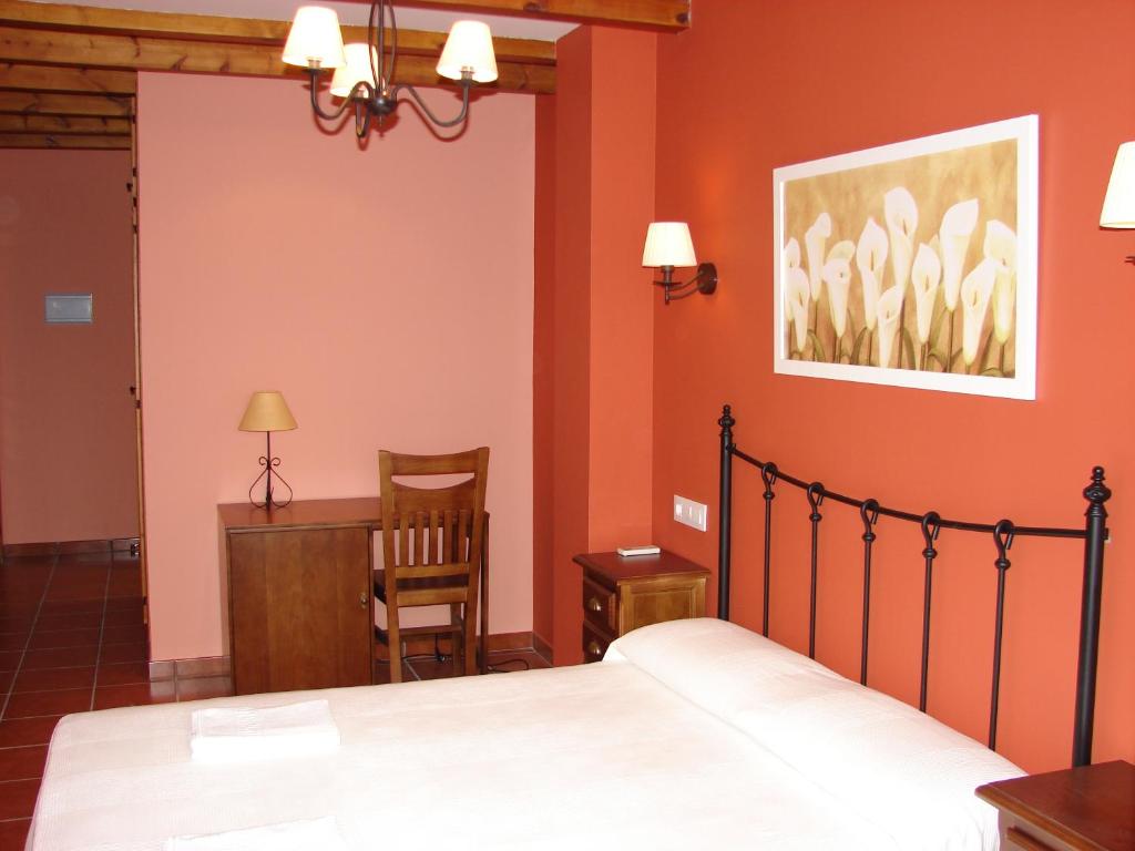 Cama o camas de una habitación en Apartamentos Sierra de Segura