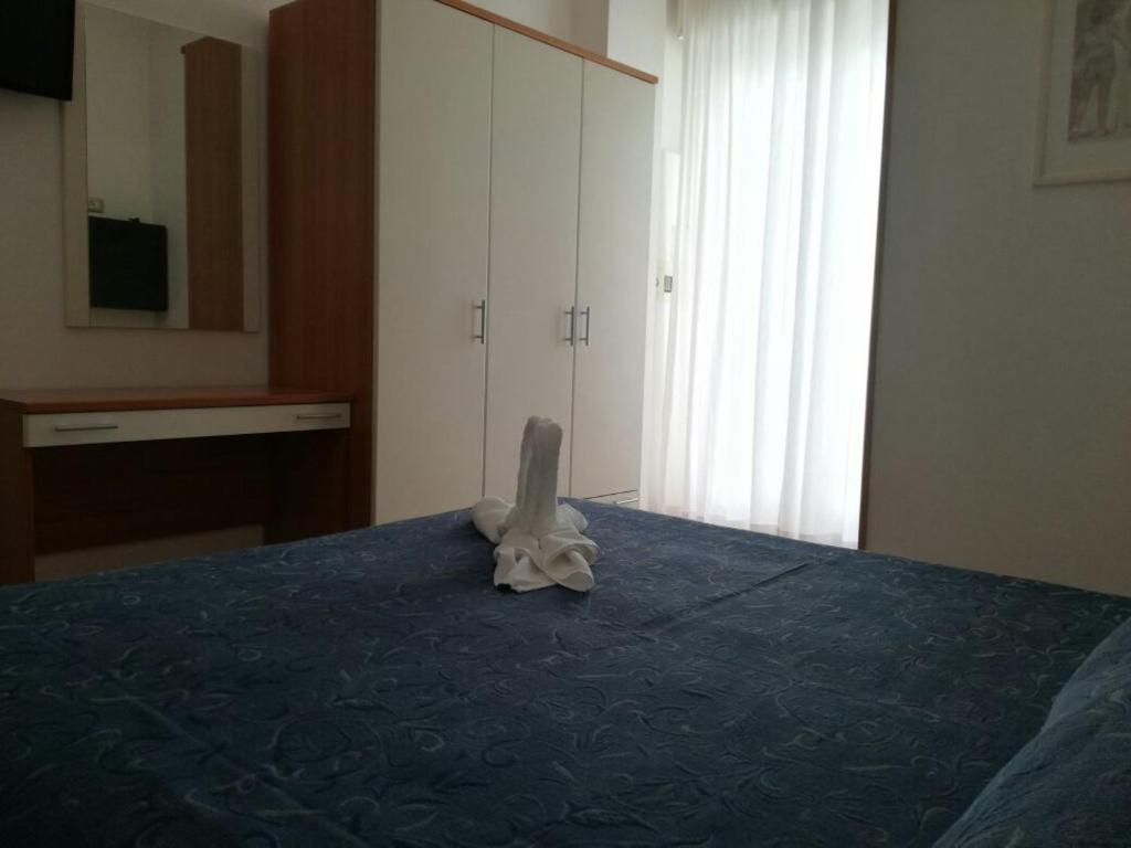 Postel nebo postele na pokoji v ubytování Hotel Atlas