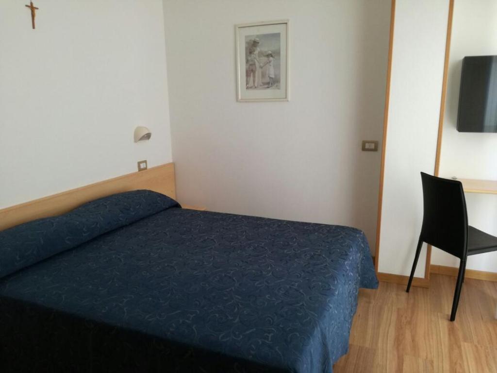 Postel nebo postele na pokoji v ubytování Hotel Atlas