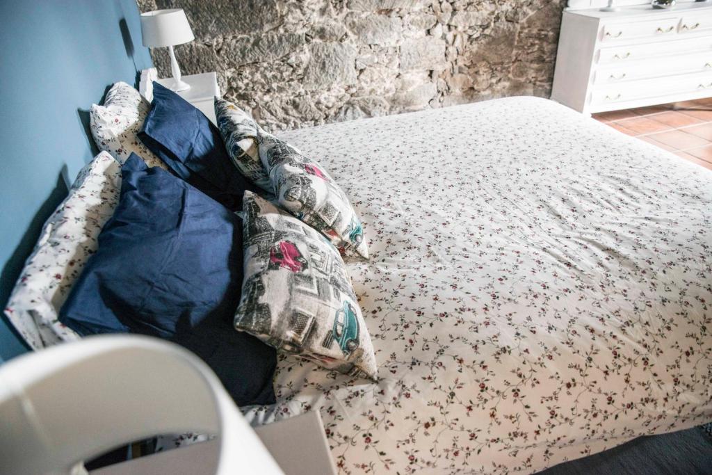 A bed or beds in a room at Casa La Dama de Arucas