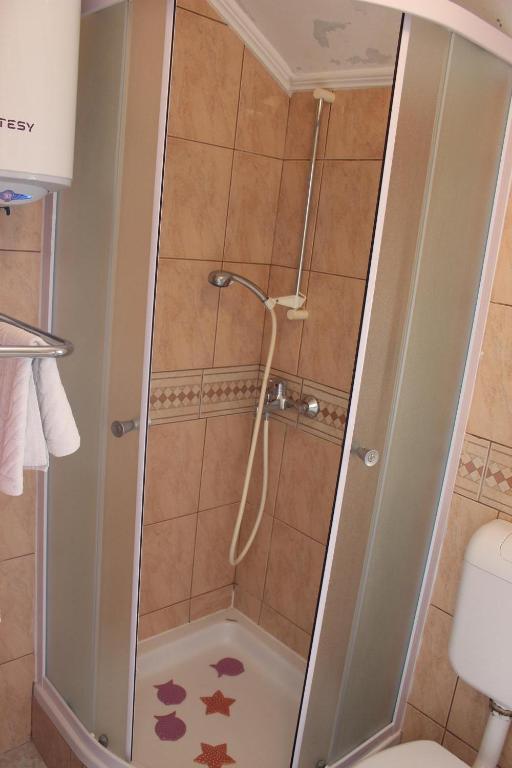 Koupelna v ubytování Guest House Dada