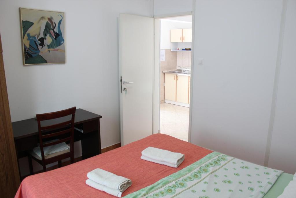Postel nebo postele na pokoji v ubytování Guest House Dada
