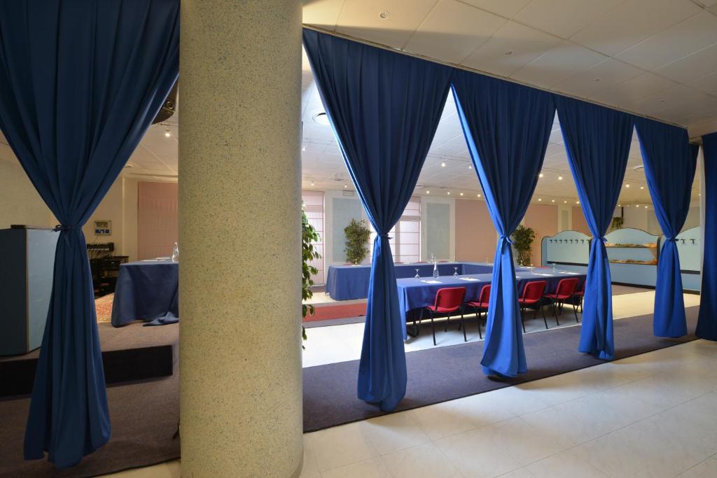 Postel nebo postele na pokoji v ubytování Hotel Eden