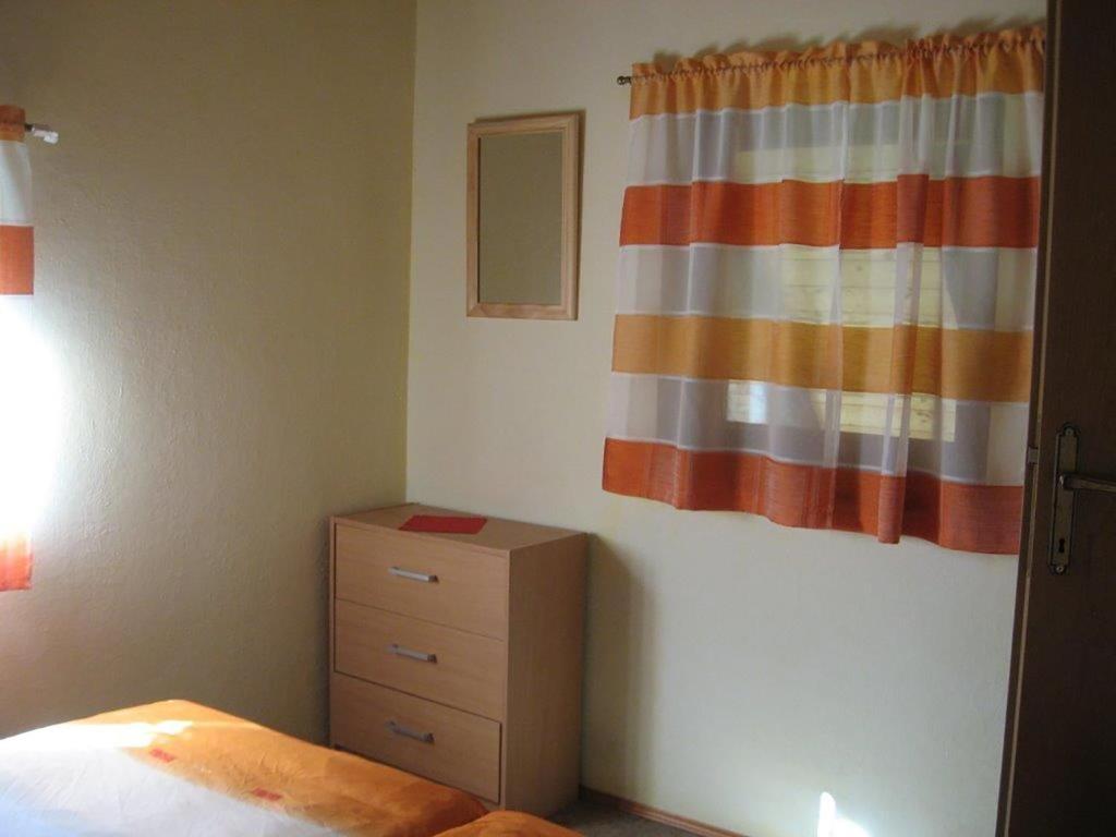Postel nebo postele na pokoji v ubytování Apartments and rooms Oasis of peace