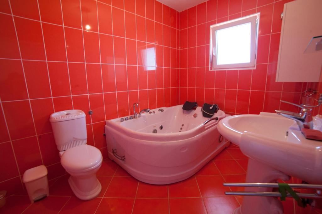 Koupelna v ubytování Guest House Aldin