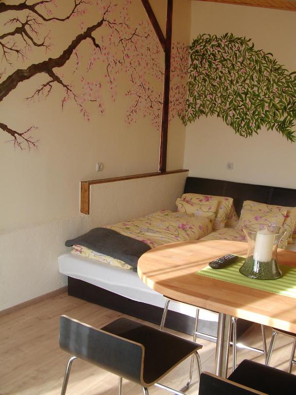 Posteľ alebo postele v izbe v ubytovaní Kiserdei Apartman