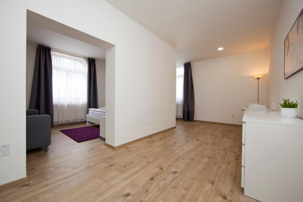 Postel nebo postele na pokoji v ubytování Rozmaryn Rooms & Apartments