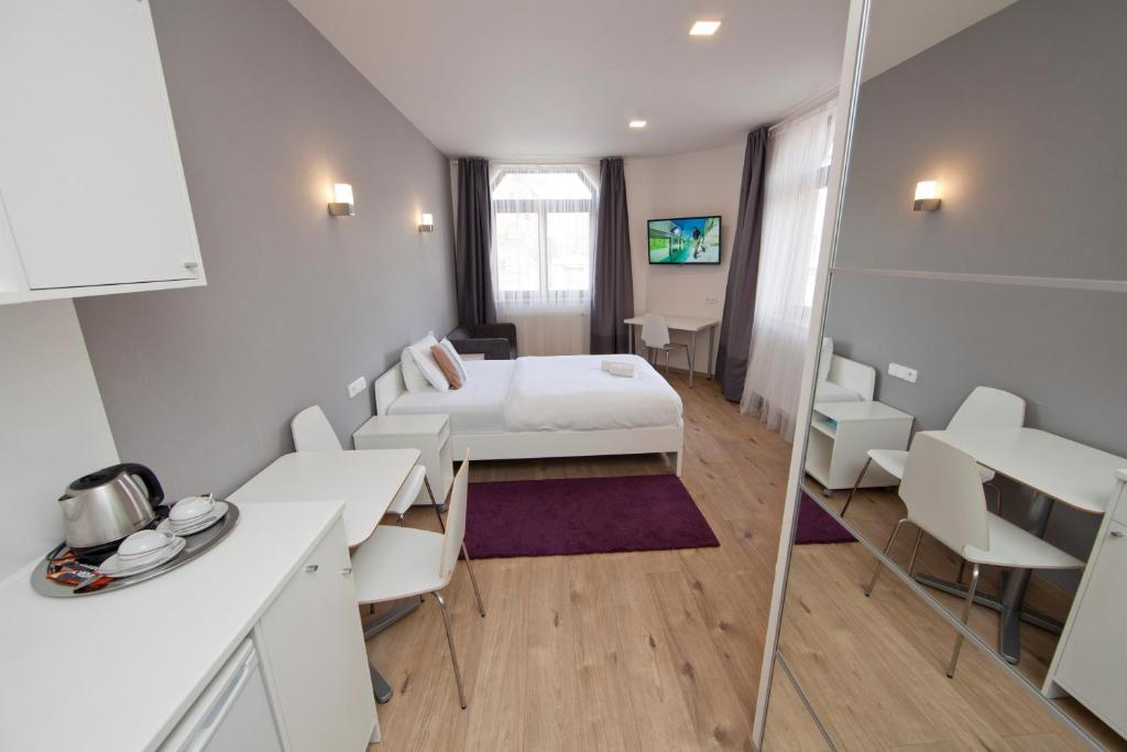 Postel nebo postele na pokoji v ubytování Rozmaryn Rooms & Apartments