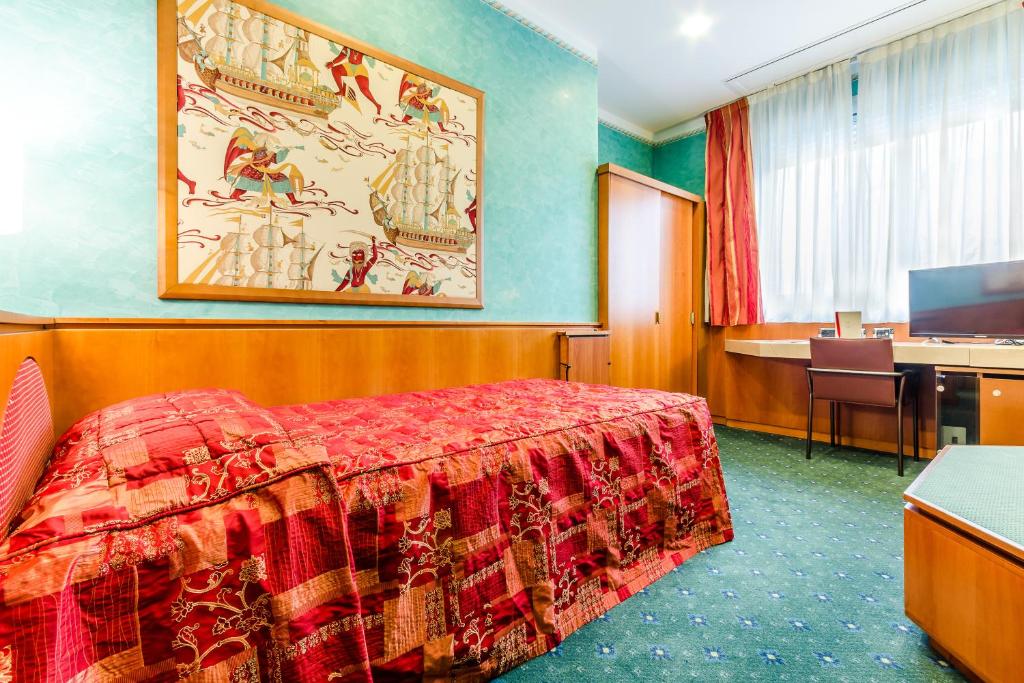 TV a/nebo společenská místnost v ubytování Brunelleschi Hotel