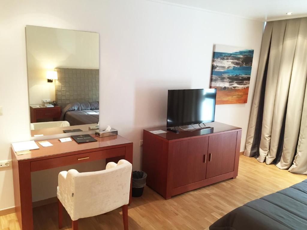 TV a/nebo společenská místnost v ubytování Theoxenia Residence
