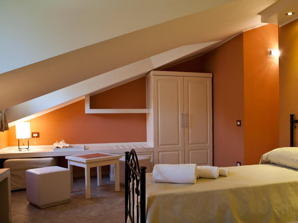 Postel nebo postele na pokoji v ubytování B&B 7Cento Ulivi