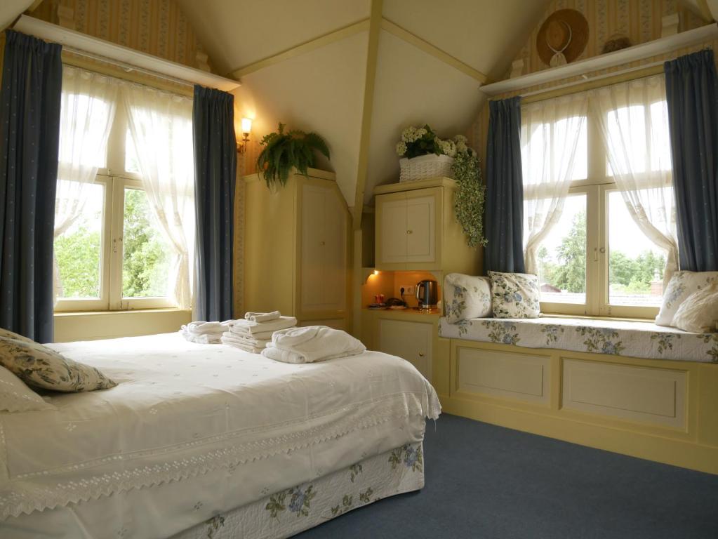 Postel nebo postele na pokoji v ubytování Hotel Pegasus