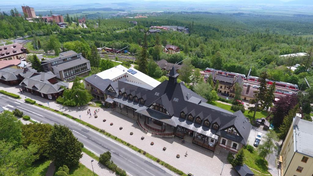 an overhead view of a building in a city at Central Apartmany in Vysoke Tatry - Stary Smokovec