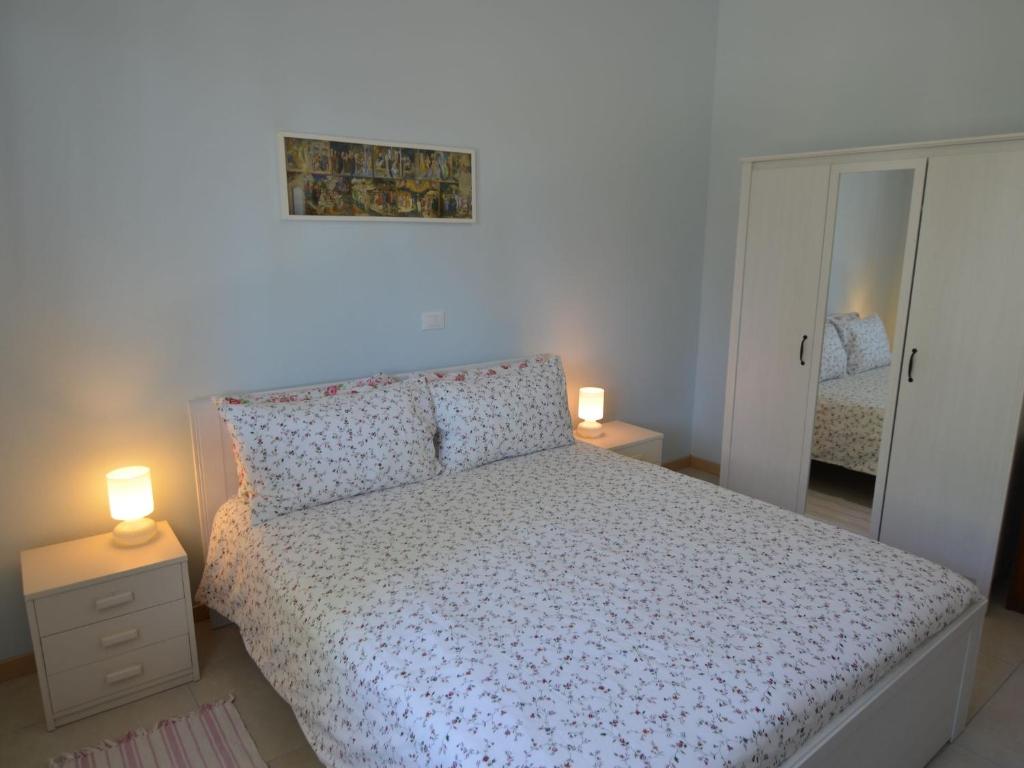 Łóżko lub łóżka w pokoju w obiekcie Apartment in Gatteo near Adriatic Beach