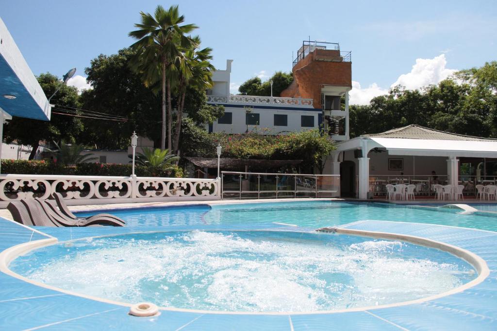 La alberca dentro o cerca de Bosque Hotel
