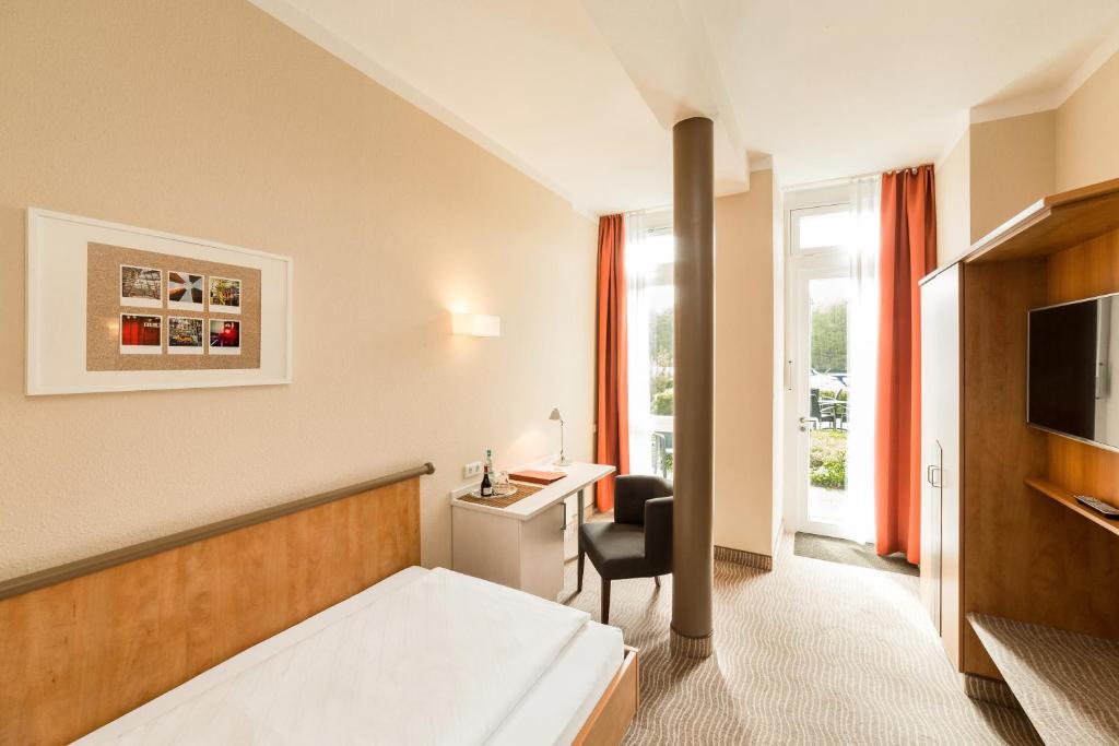 TV a/nebo společenská místnost v ubytování Hotel Spree-idyll