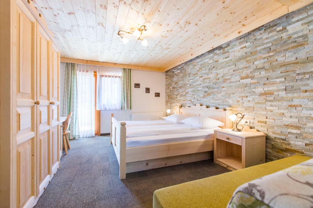 Postel nebo postele na pokoji v ubytování Penzion Berc