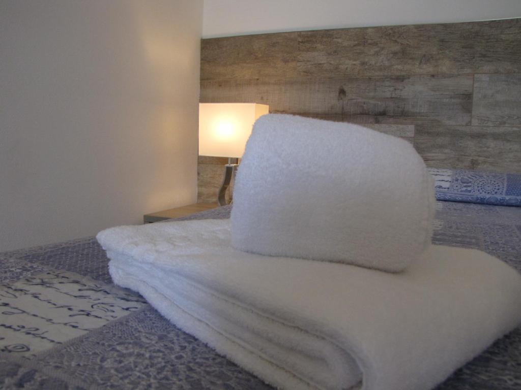Postel nebo postele na pokoji v ubytování Residence Villa Margherita