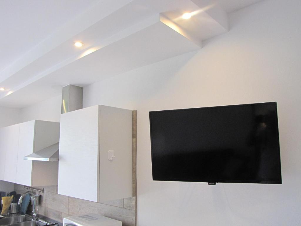 TV a/nebo společenská místnost v ubytování Residence Villa Margherita