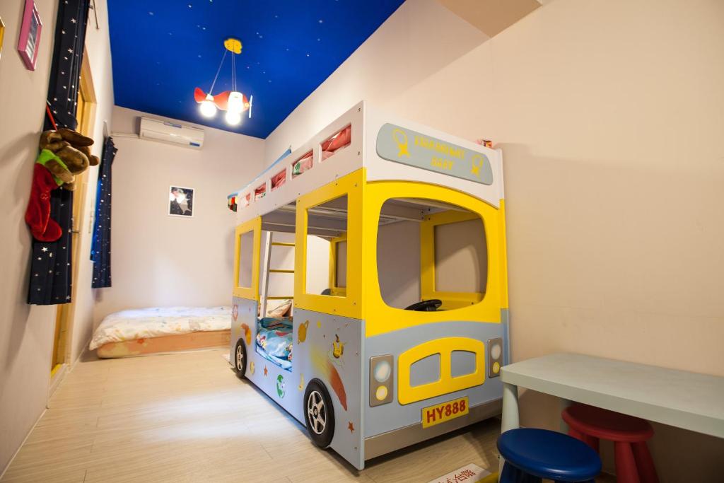 a childs room with a toy fire truck at House 22 in Kaohsiung