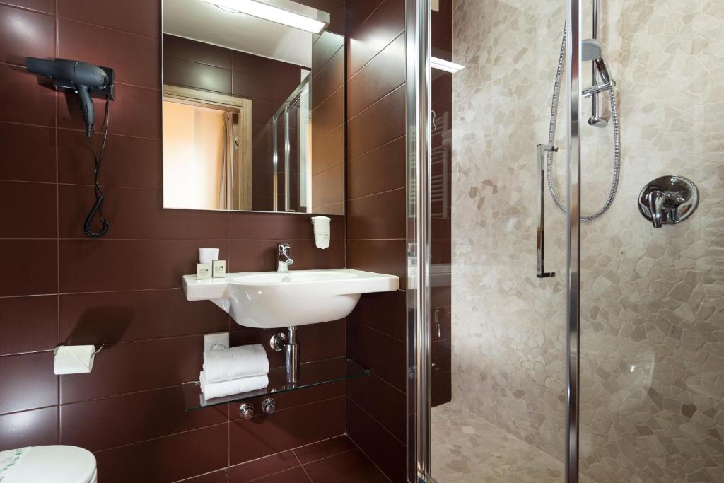 Kúpeľňa v ubytovaní Hotel Rossini
