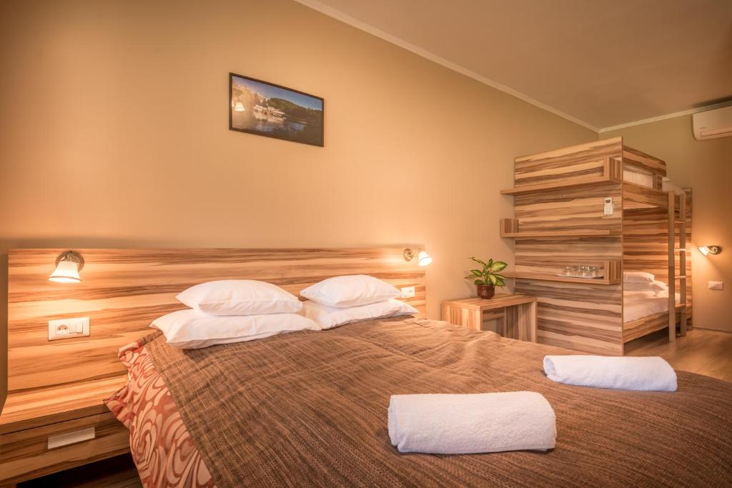 Postel nebo postele na pokoji v ubytování Németh Resort